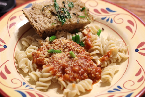 garlic scapes on bread and pasta