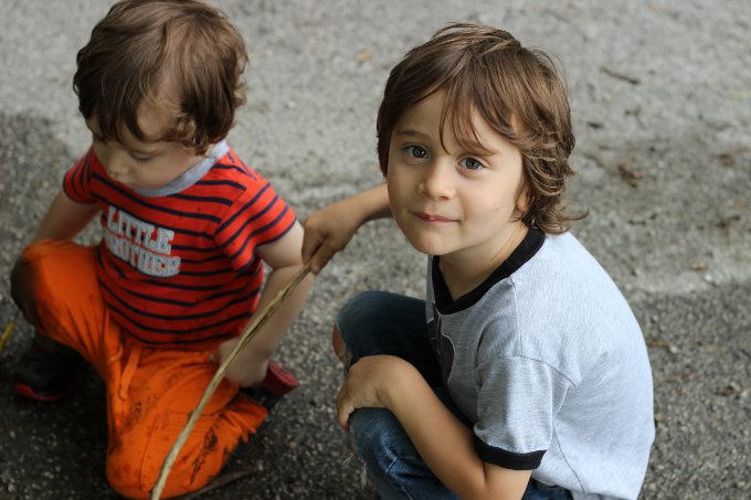 My little helpers, playing in the mud!